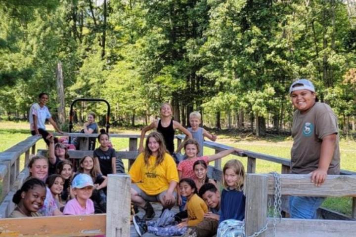 a couple of people that are sitting on a bench