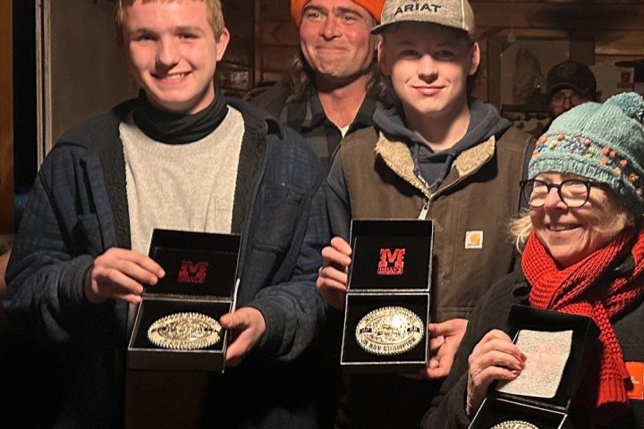 a group of people posing for a photo