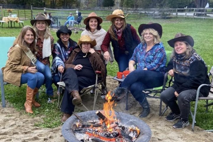 a group of people posing for the camera