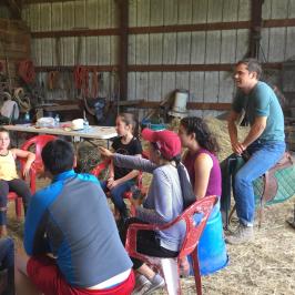 a group of people standing in front of a crowd