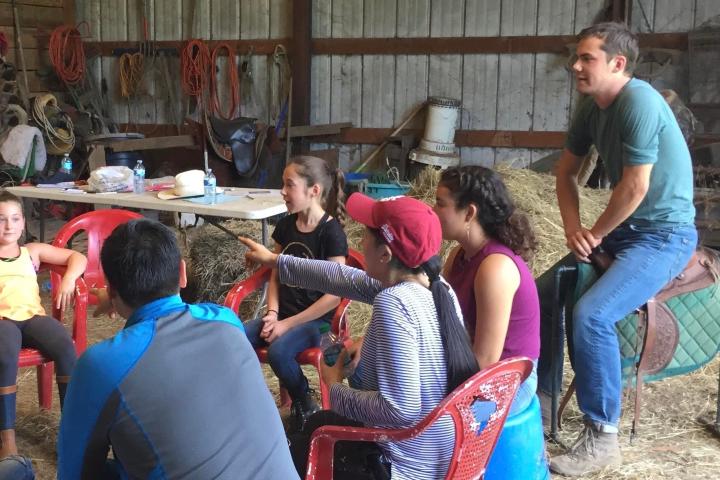 a group of people standing in front of a crowd