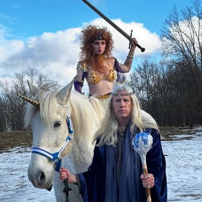 a person riding a horse in the snow