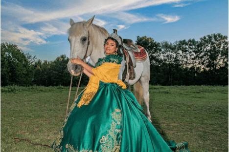 a horse standing on top of a grass covered field