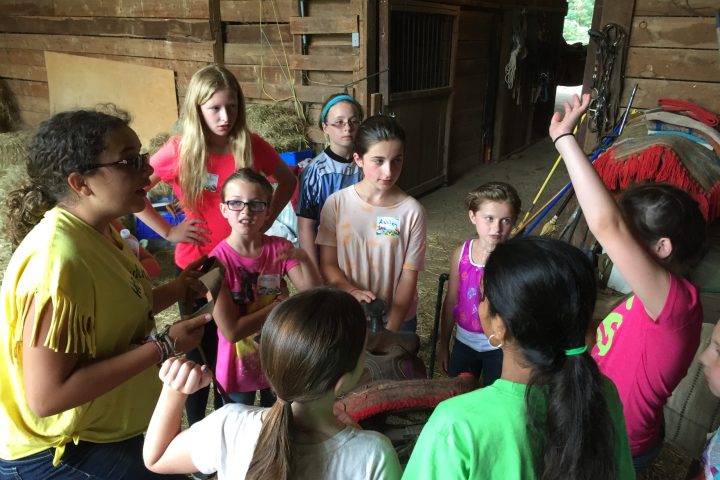 a group of people sitting in front of a crowd