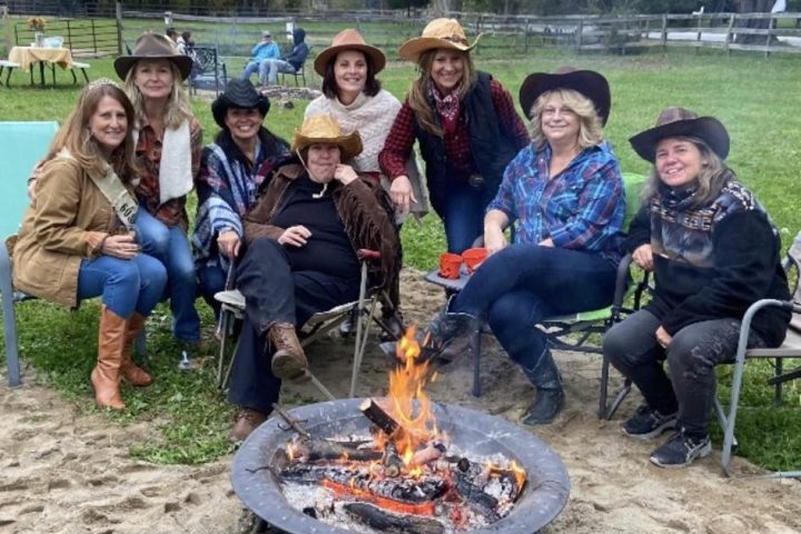 a group of people posing for the camera