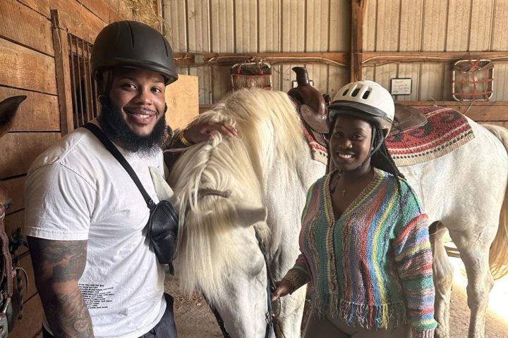 a couple of people that are standing in the street
