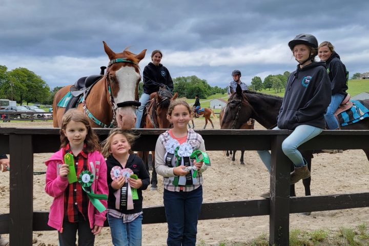 a group of people posing for the camera