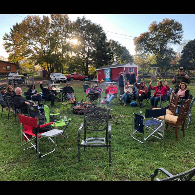 a group of people sitting in a chair