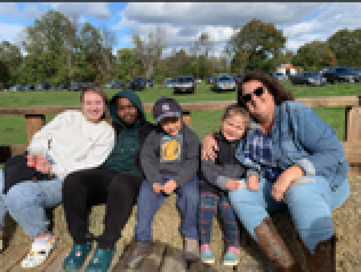 a group of people posing for the camera