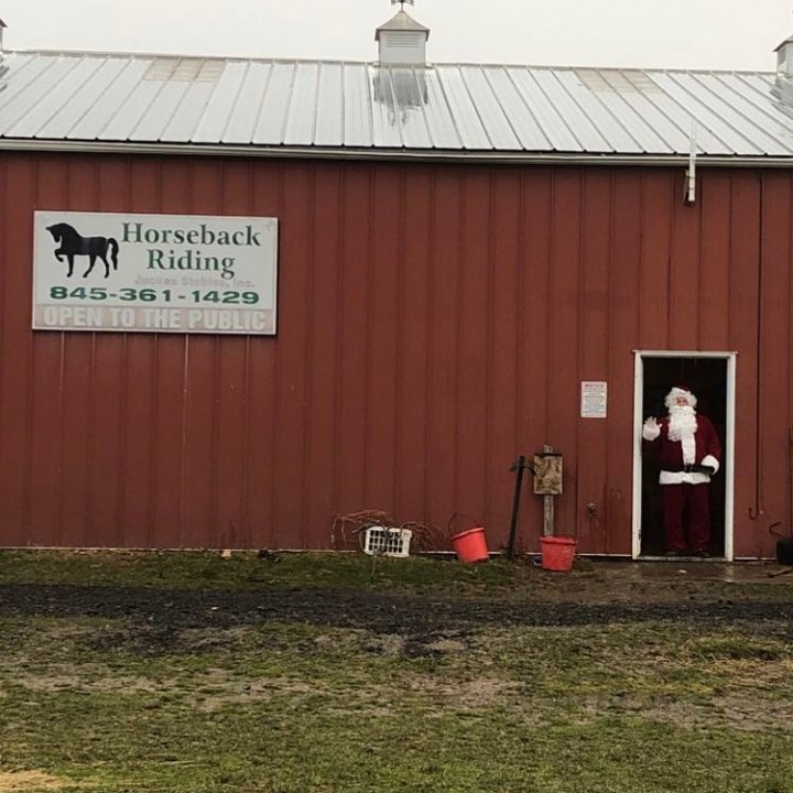 a sign in front of a house