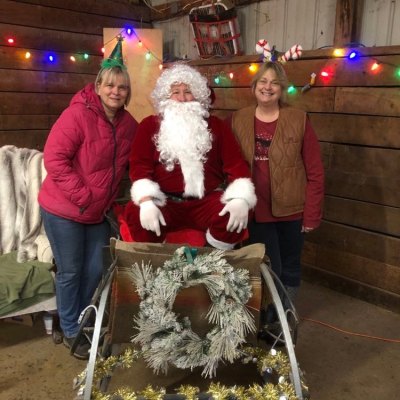 a person cutting a cake