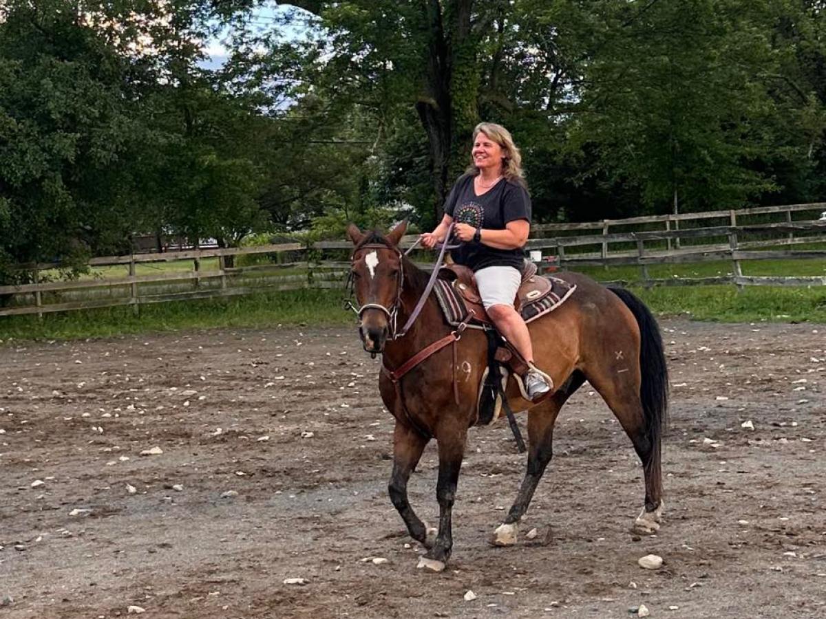 a man riding a horse