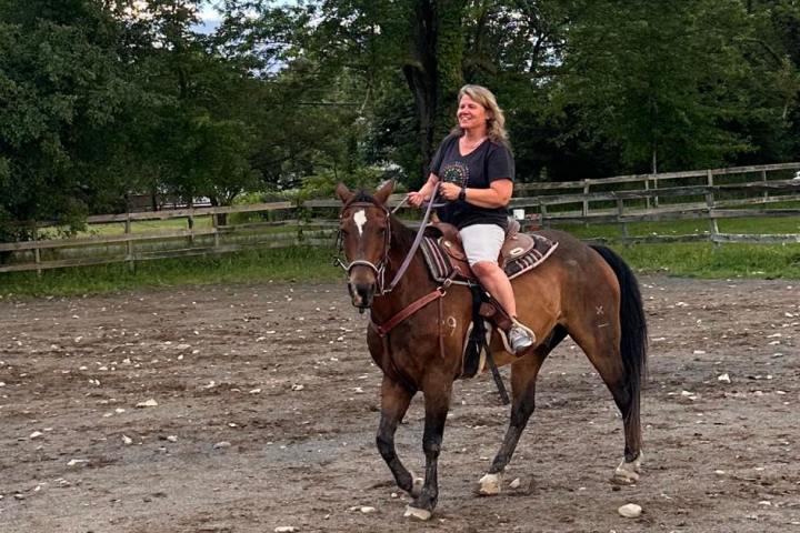 a man riding a horse
