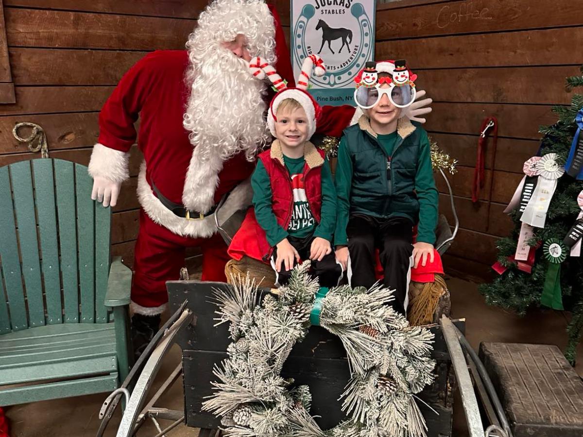 a group of people standing in front of a building