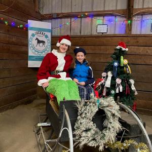 Tessa Allen riding on the back of a bicycle